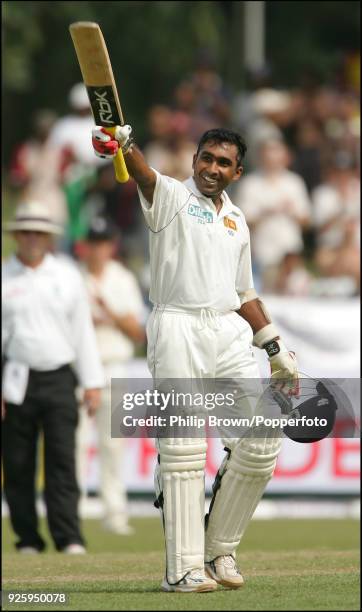 Sri Lanka captain Mahela Jayawardene celebrates reaching his century during his innings of 195 in the 2nd Test match between Sri Lanka and England at...