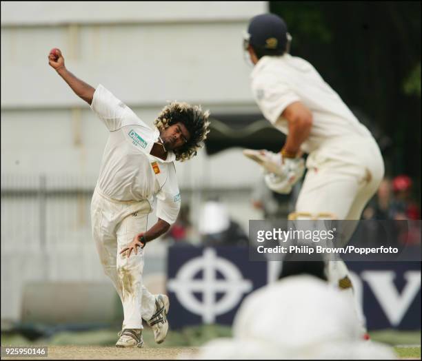 Lasith Malinga of Sri Lanka bowling to England batsman Alastair Cook during the 2nd Test match between Sri Lanka and England at the Sinhalese Sports...