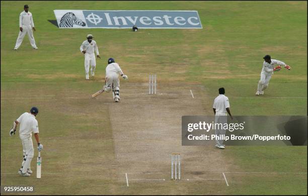 Monty Panesar of England is run out by Sri Lanka's wicketkeeper Prasanna Jayawardene and England are all out for 81 on day three of the 3rd Test...