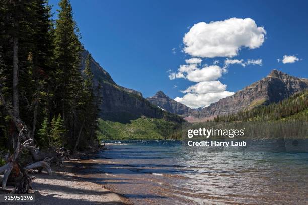 two medicine lake, cloudy sky, glacier national park, montana, usa - lago two medicine montana - fotografias e filmes do acervo