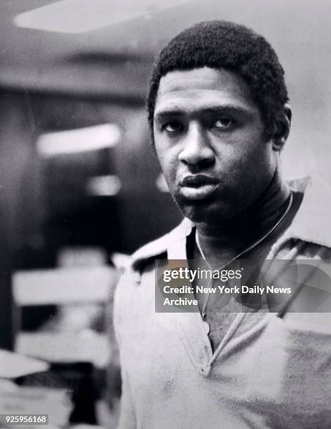 Basketball great Willis Reed under arrest.