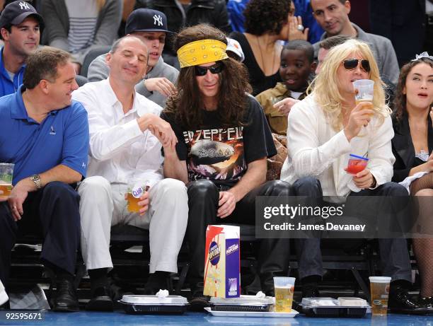 Tennis player John McEnroe attends the Philadelphia 76ers game against the New York Knicks at Madison Square Garden on October 31, 2009 in New York...