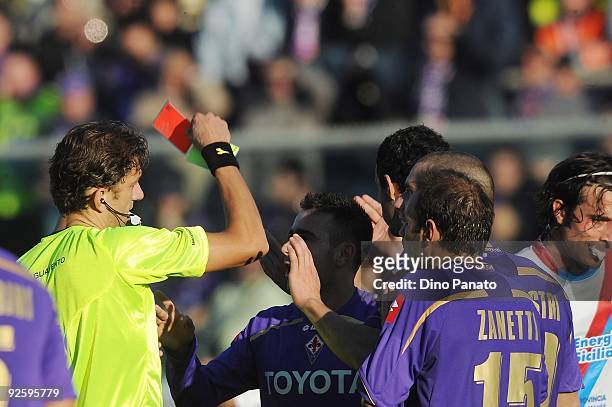 Referee Paolo Tagliavento shows the re card to Alessandro Gamberini of ACF Fiorentina during the Serie A match between ACF Fiorentina and Catania...