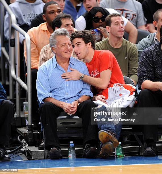 Actors Dustin Hoffman and son Jake Hoffman attend the Philadelphia 76ers game against the New York Knicks at Madison Square Garden on October 31,...