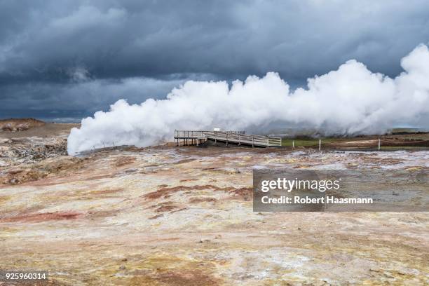 water vapor coming out of a hole, geothermal area gunnuhver, reykjanesskagi, iceland - reykjanesskagi stock pictures, royalty-free photos & images