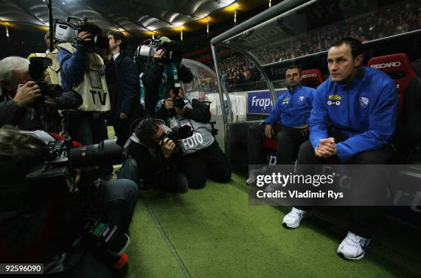 New Bochum head coach Heiko Herrlich sits on the bench ahead of the Bundesliga match between Eintracht Frankfurt and VfL Bochum at Commerzbank Arena...