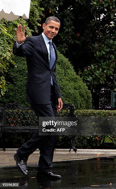 President Barack Obama departs the White House on a rainy morning for a day trip to Philadelphia, Pennsylvania and Newark, New Jersey on the South...