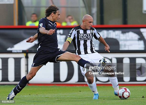 Sebastiano Siviglia SS Lazio and Massimo Maccarone AC Siena in action during the Serie A match between AC Siena and SS Lazio at Artemio Franchi - Mps...