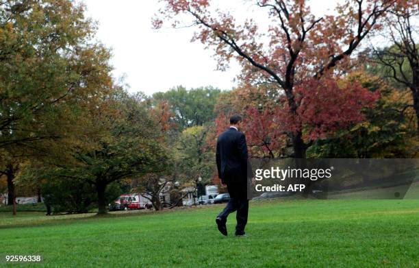 President Barack Obama departs the White House on a rainy morning for a day trip to Philadelphia, Pennsylvania and Newark, New Jersey on the South...