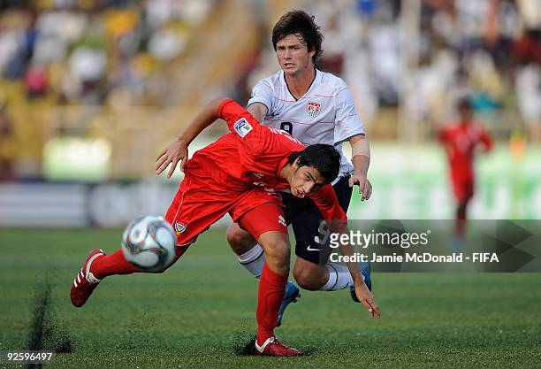 Mohamed Hussain of the United Arab Emirates battles with Jack McInerney of USA during the match between USA and United Arab Emirates at the The...