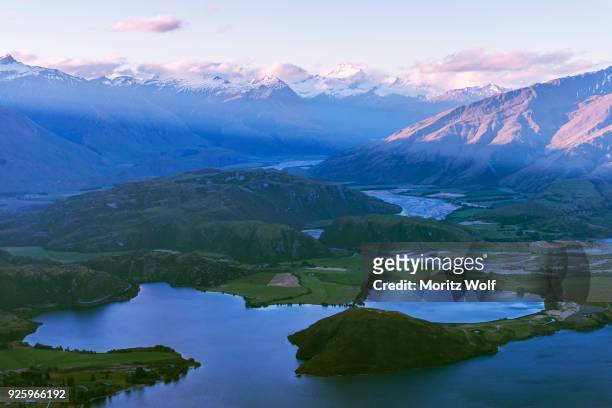 view of mountains and lake after sunset, glendhu bay, lake wanaka, southern alps, otago region, southland, new zealand - region otago stock pictures, royalty-free photos & images