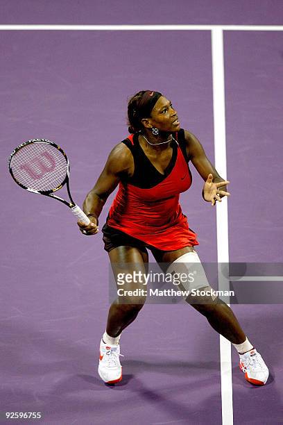 Serena Williams of the United States fades back for a shot against Venus Williams of the United States during the final of the Sony Ericsson WTA...