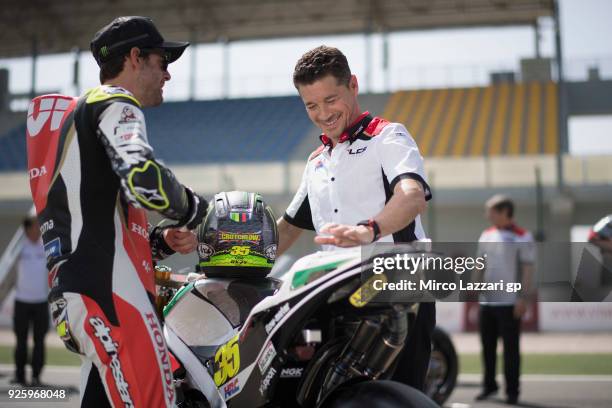 Cal Crutchlow of Great Britain and LCR Honda speaks with Lucio Cecchinello of Italy and LCR Honda MotoGP during the MotoGP Testing - Qatar at Losail...