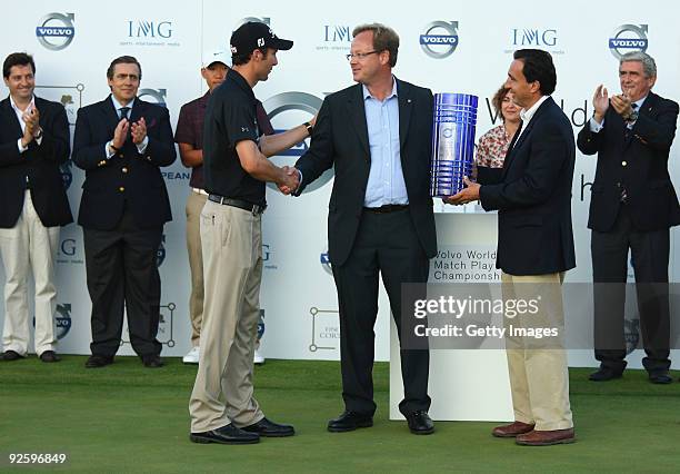 Ross Fisher of England is congratulated by President & CEO of Volvo Event Management Per Ericsson following his victory in the Final of the Volvo...