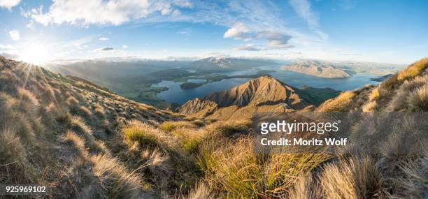 view of mountains and lake, roys peak, lake wanaka, southern alps, otago region, southland, new zealand - region otago stock pictures, royalty-free photos & images