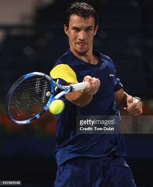 Evgeny Donskoy of Russia plays a forehand during his quarter final match against Filip Krajinovic of Serbia on day four of the ATP Dubai Duty Free...