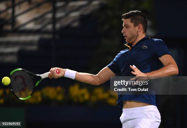 Filip Krajinovic of Serbia plays a forehand during his quarter final match against Evgeny Donskoy of Russia on day four of the ATP Dubai Duty Free...