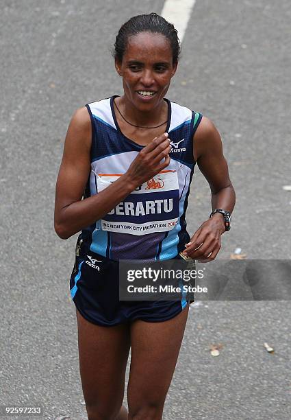 Derartu Tulu of Ethiopia celebrates after winning the 40th womens ING New York City Marathon on November 1, 2009 in New York City.