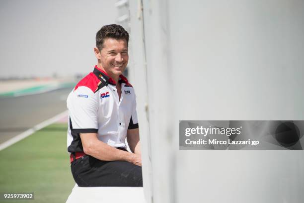 Lucio Cecchinello of Italy and LCR Honda MotoGP smiles in pit wall during the MotoGP Testing - Qatar at Losail Circuit on March 1, 2018 in Doha,...