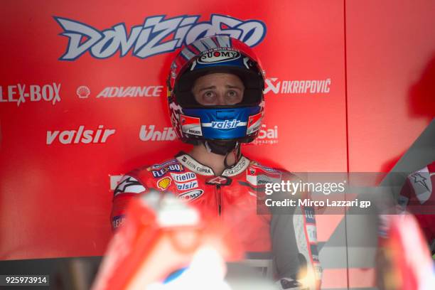 Andrea Dovizioso of Italy and Ducati Team looks on in the pit during the MotoGP Testing - Qatar at Losail Circuit on March 1, 2018 in Doha, Qatar.