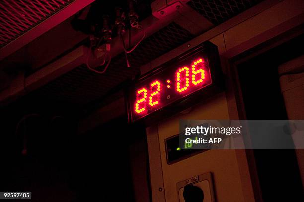 Picture taken on October 20 off Toulon, shows an electronic clock and a diving depth gauge of French SNA class submarine "Casabianca", during a...