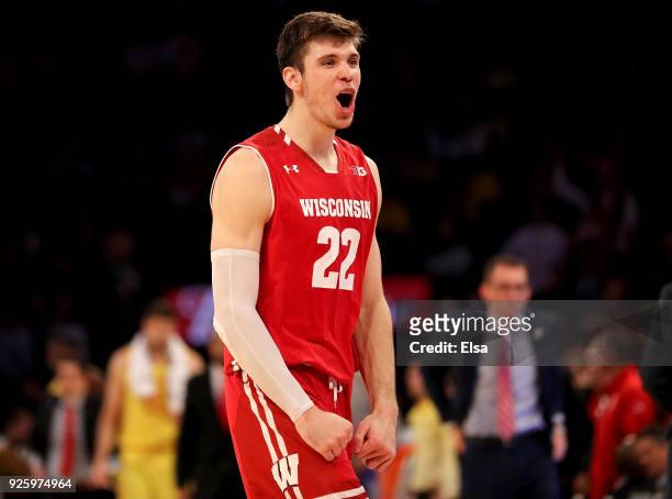 Ethan Happ of the Wisconsin Badgers celebrates the 59-54 win over the Maryland Terrapins during the second round of the Big Ten Basketball Tournament...