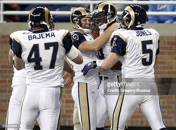 Daniel Fells of the St. Louis Rams celebrates a touchdown off of a fake field goal with Josh Brown, Donnie Jones and Billy Bajema while playing the...