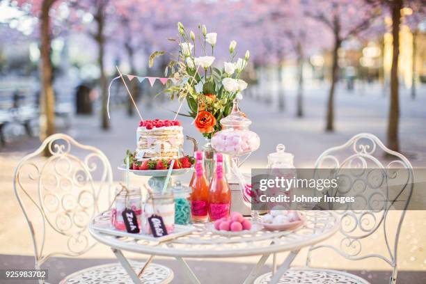 outdoor table filled with variousâ confectioneries - banderoll bildbanksfoton och bilder