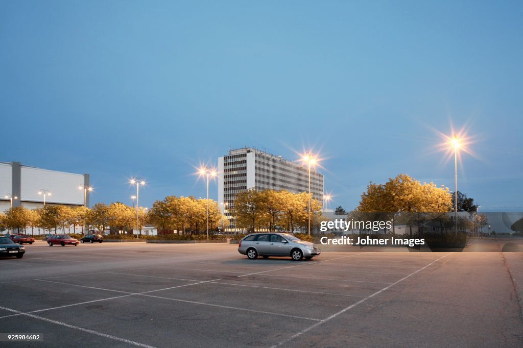 Single car in parking at evening