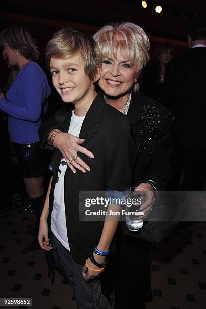 Gloria Hunniford and grandson Gabriel attend the PINKTOBER Women Of Rock Charity Concert at the Royal Albert Hall on November 1, 2009 in London,...