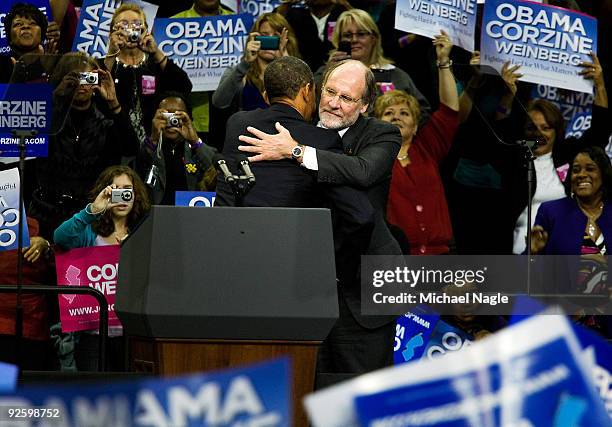 President Barack Obama hugs New Jersey Gov. Jon Corzine at a campaign rally at the Prudential Center on November 1, 2009 in Newark, New Jersey. Gov....