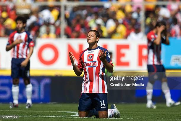 Chivas' players Edgar Mejia, Javier Hernandez and Aaron Galindo gesture during their match as part of the Mexican Football League Apertura 2009 at...