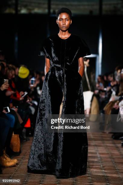 Model walks the runway during the Uma Wang show at Lycee Henry IV as part of the Paris Fashion Week Womenswear Fall/Winter 2018/2019 on March 1, 2018...