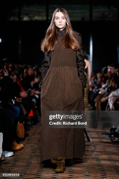 Model walks the runway during the Uma Wang show at Lycee Henry IV as part of the Paris Fashion Week Womenswear Fall/Winter 2018/2019 on March 1, 2018...