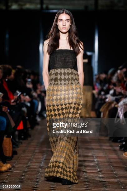 Model walks the runway during the Uma Wang show at Lycee Henry IV as part of the Paris Fashion Week Womenswear Fall/Winter 2018/2019 on March 1, 2018...