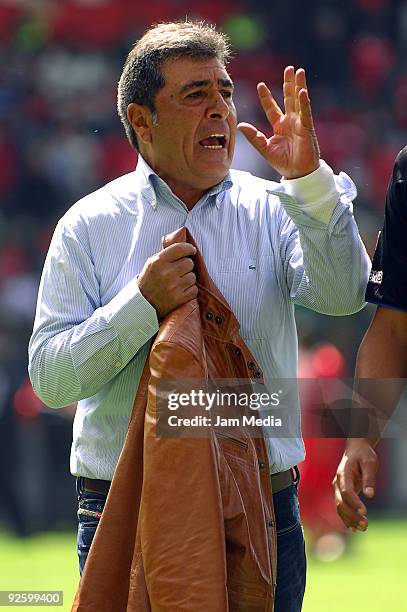 Head coach Carlos Reinoso of Queretaro gestures during their match in the 2009 Opening tournament as part of the Mexican Football League, at the...