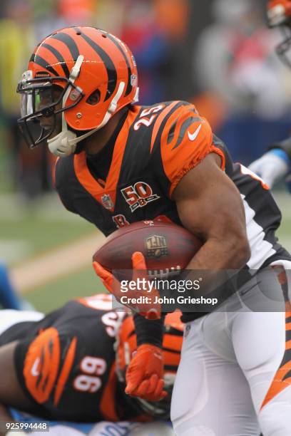 Giovani Bernard of the Cincinnati Bengals runs the football upfield during the game against the Detroit Lions at Paul Brown Stadium on December 24,...