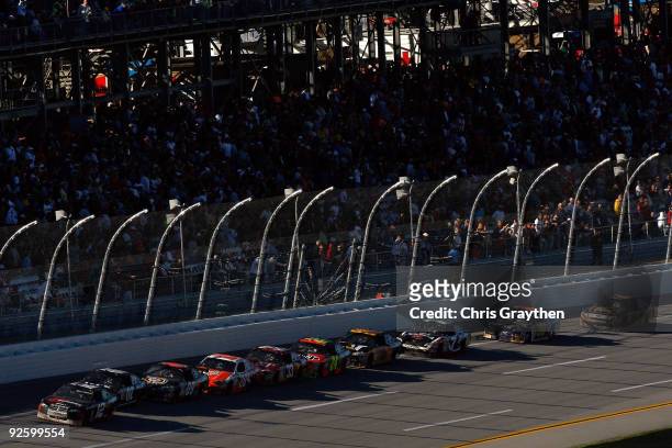David Stremme, driver of the Penske Dodge leads the field during the NASCAR Sprint Cup Series AMP Energy 500 at Talladega Superspeedway on November...
