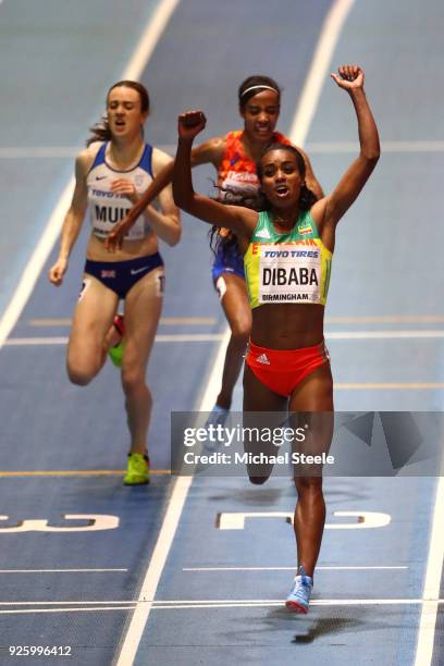 Genzebe Dibaba of Ethopia celebrates winning the womens 3000 metres final ahead of Sifan Hassan of Netherlands and Laura Muir of Great Britian on Day...