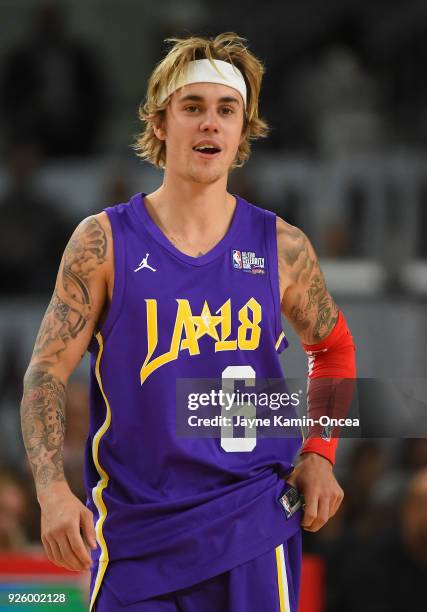 Canadian singer and songwriter Justin Bieber plays during the 2018 NBA All-Star Game Celebrity Game at Los Angeles Convention Center on February 16,...