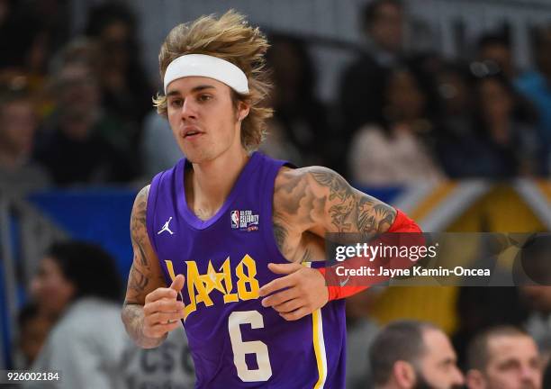 Canadian singer and songwriter Justin Bieber plays during the 2018 NBA All-Star Game Celebrity Game at Los Angeles Convention Center on February 16,...