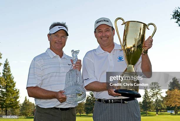 John Cook poses with the championship trophy and Loren Roberts poses with the the Schwab Cup at the Sonoma Golf Club on November 1, 2009 in Sonoma,...