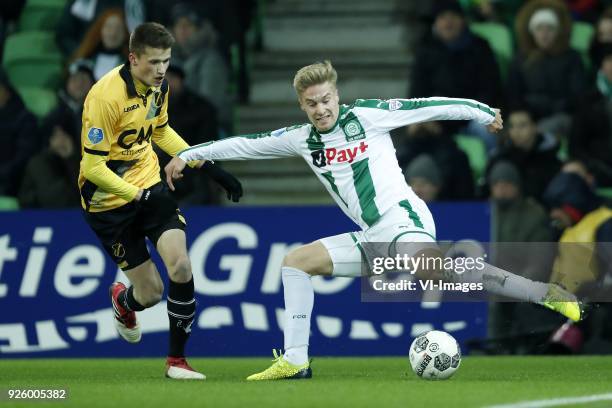 Lucas Schoofs of NAC Breda, Tom van Weert of FC Groningen during the Dutch Eredivisie match between FC Groningen and NAC Breda at Noordlease stadium...