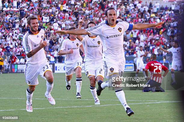 Landon Donovan of the Los Angeles Galaxy celebrates scoring a goal against Chivas USA during Game One of the MLS Western Conference Semifinals at The...