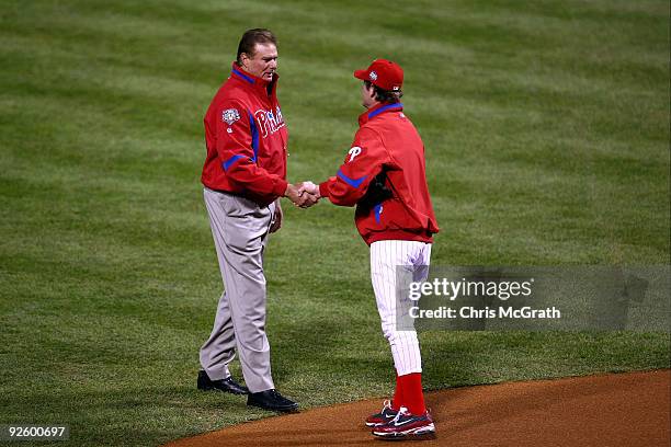 Former Philadelphia Phillies pitcher of Baseball Hall of Famer Steve Carlton greets Jamie Moyer of the Phillies after Carlton threw out the...