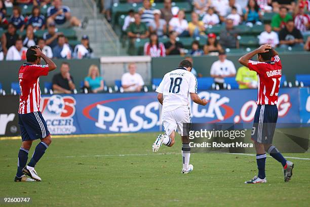 Ante Jazic and Jonathan Bornstein of Chivas USA look on in frustration after allowing a goal by Mike Magee of the Los Angeles Galaxy during Game One...