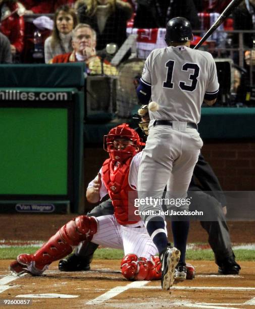 Alex Rodriguez of the New York Yankees is hit by a pitch throw by Joe Blanton of the Philadelphia Phillies in Game Four of the 2009 MLB World Series...