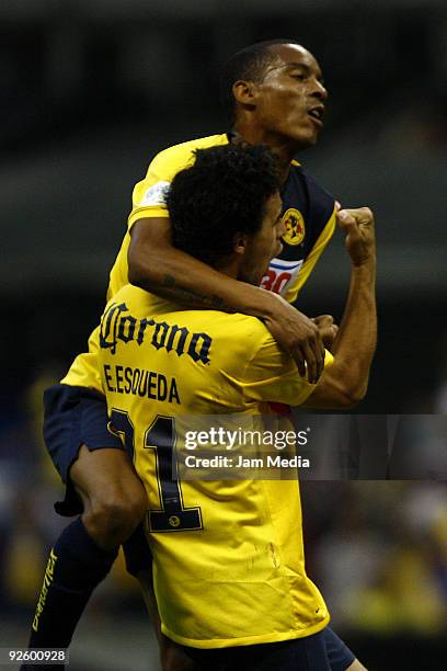 Enrique Esqueda and Adolfo Rosinei of America celebrate during their match as part of the 2009 Opening tournament, the closing stage of the Mexican...