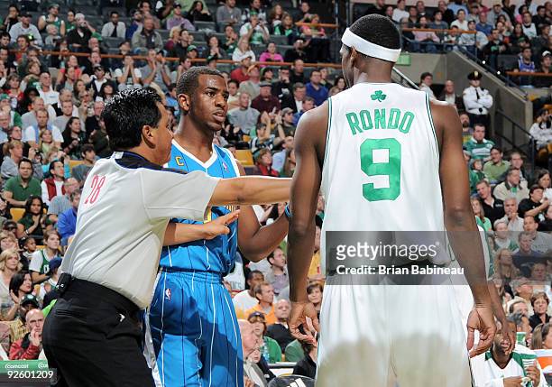 Rajon Rondo of Boston Celtics talks to Chris Paul of the New Orleans Hornets on November 1, 2009 at the TD Garden in Boston, Massachusetts. NOTE TO...