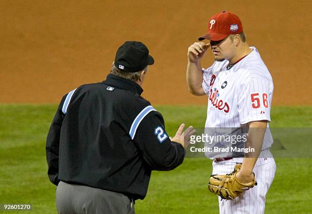 Philadelphia Phillies starting pitcher Joe Blanton gets warned by umpire Joe West after Alex Rodriguez is hit by a pitch in the top of the first...